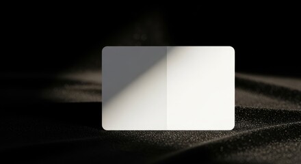 Blank White Card Mockup on Dark Textured Surface with Light.