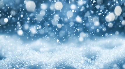Gentle snowflakes fall softly on a serene winter landscape creating a peaceful and tranquil atmosphere with a blurred blue background and sparkling bokeh lights