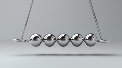 Newton’s cradle with six metallic balls on light background