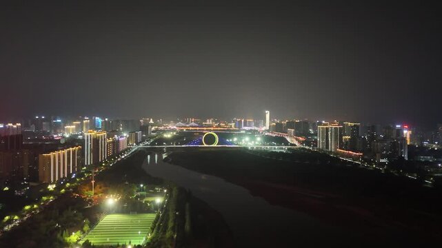 Baoji City Night Aerial View with Wei River and Illuminated Ferris Wheel, Shaanxi
