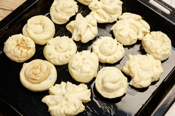 A tray of baked goods with a variety of shapes and sizes