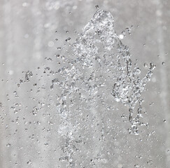 A spray of water is falling from the sky