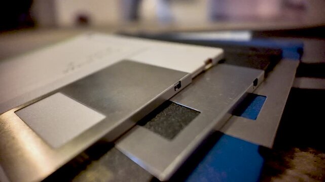 Close up view of stacked floppy disks, representing vintage computer data
