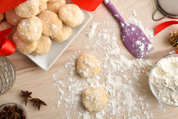 Wooden kitchen bench preparing anise cookies top view