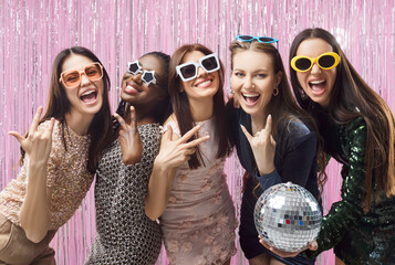 Happy multiracial friends girls fun wearing cute sunglasses, women at club, diverse female laughing celebrate, entertainment wedding gathering hen party, bachelorette party hen night, cool event 