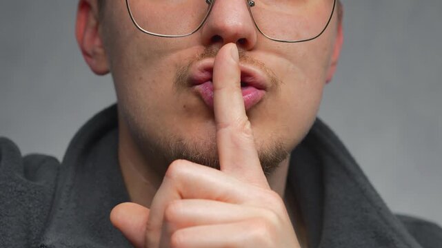 Don't shout and speak in a whisper.
Shh is a finger gesture.
Please don't speak loudly and maintain silence.
A finger to the mouth is a silence gesture.