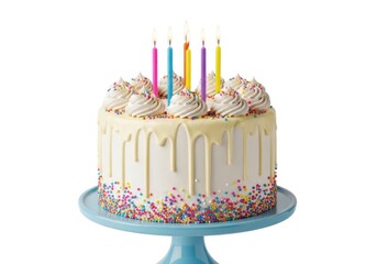 A delicious white cake with colorful sprinkles and lit birthday candles