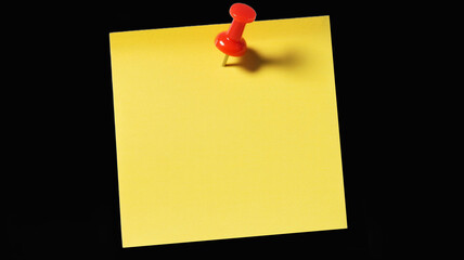 Brighten your day with this vibrant yellow sticky note pinned up for important reminders and to-do lists