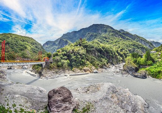 Red suspension bridge and mountain landscape in Taiwan