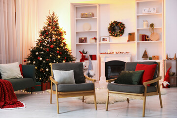 Fireplace, armchairs, Christmas tree and festive decor in stylish room
