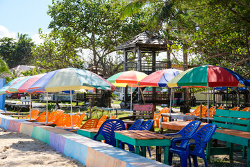 Colorful umbrella beach at Labuhan Jukung Beach, Krui, Lampung