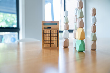 Eco-Friendly wooden calculator on minimal workspace desk.