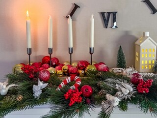 Festive Christmas Garland with Candles and Holiday Decorations