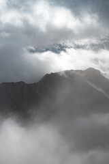 Mountain peaks in the mist
