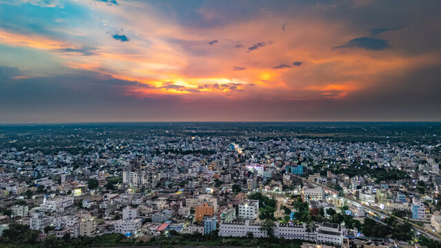 Top down Buildings and Apartment with Multiple Building aerial. Urban Buildings and Apartment at bridge road at Delhi. Cinematic cityscape drone shot. Noida Buildings.