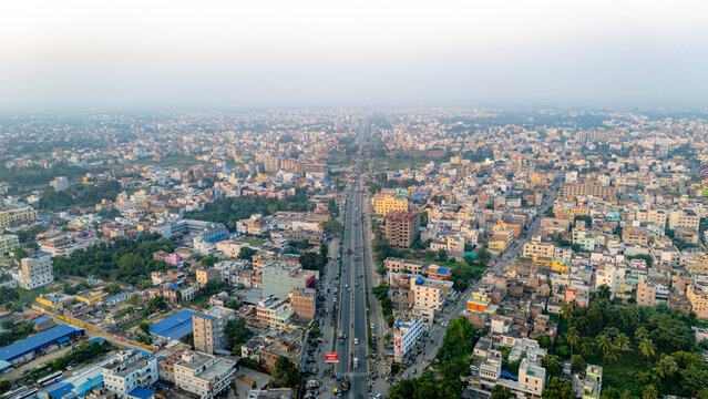Top down Buildings and Apartment with Multiple Building aerial. Urban Buildings and Apartment at bridge road at Delhi. Cinematic cityscape drone shot. Noida Buildings.