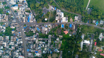 Top down Buildings and Apartment with Multiple Building aerial. Urban Buildings and Apartment at bridge road at Delhi. Cinematic cityscape drone shot. Noida Buildings.