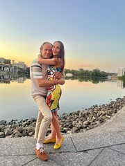 couple hugging by the river