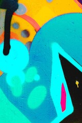 Vibrant abstract street art with neon blue, yellow, pink elements. Urban 90s, graffiti style, dynamic shapes, bold colors. Creative backgrounds, murals, artistic visuals, modern 2000s street design.