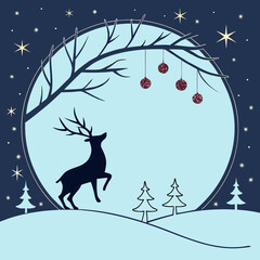 Silhouette of deer in winter landscape with christmas balls decoration