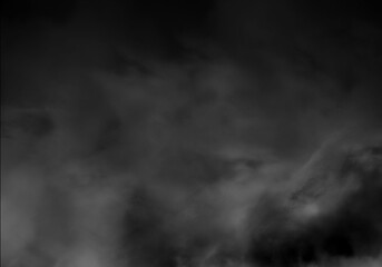 Dark abstract atmospheric smoke or cloud overlay texture with gloomy grey tones and mysterious patterns for dramatic background design