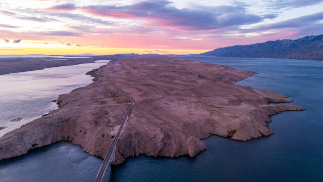 Aerial View of a Coastal Bridge in Croatia – Dramatic Adriatic Waters, Rugged Shores and Scenic Mediterranean Landscape