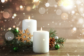 Christmas composition with burning candles on table, bokeh lights. Greeting card