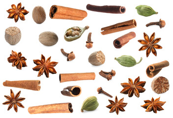 Set of different Christmas spices on white background. Anise, nutmeg, cardamom, clove and cinnamon