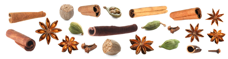 Set of different Christmas spices on white background. Anise, nutmeg, cardamom, clove and cinnamon