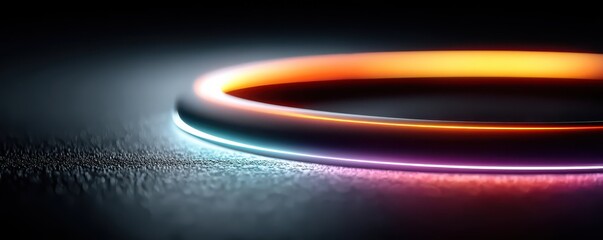 Colorful neon rings swirl on a dark backdrop, creating a vibrant, futuristic abstract image