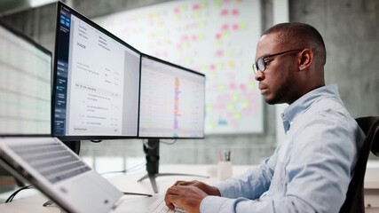 Chartered Accountant Reviewing Multiple Invoices