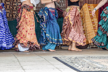 Belly dancers performing folk dance at cultural festival