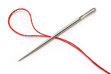 Stunning macro shot of a needle threaded with vibrant red yarn perfect for sewing projects and creative designs on white backdrop