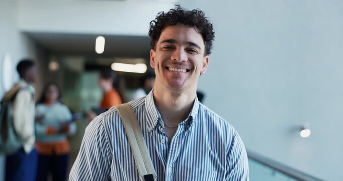 Confident, student and man in college, face or happy to learn with scholarship, education or hallway. Learner, laugh and people with funding opportunity for university, knowledge and academic grant