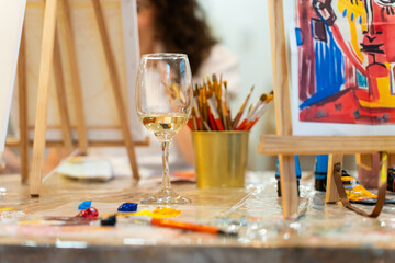 Sip and paint workshop creating art with wine