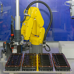 Robot Arm Applying Dispensing Liquid Sealant to Parts in Car Factory
