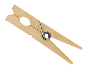 One classic wooden clothespin for linen isolated on a transparent background. Full depth of field. PNG.