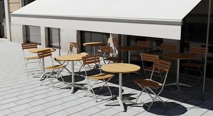 Empty outdoor cafe terrace with wooden tables and chairs under a white awning in sunlight