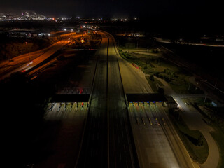 Blurry streaks of light on a busy highway at night, capturing the fast movement