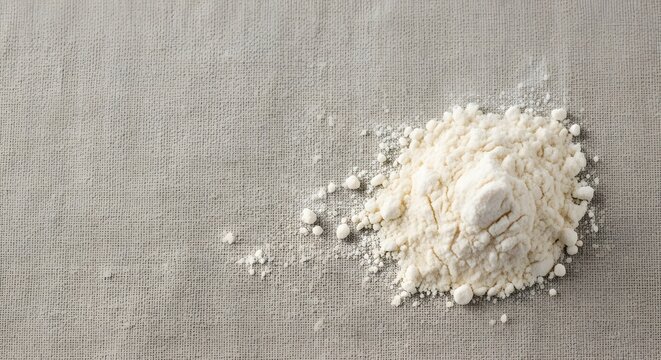 A macro flat lay of baking flour on a linen Thanksgiving card background