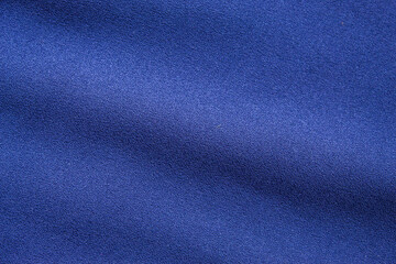 Dark blue cloth background with a dark luxurious impression