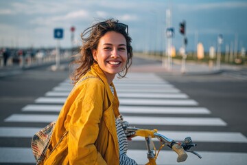 Joyful young woman on a bike at a crosswalk Lifestyle Idea