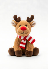 Fototapeta premium christmas reindeer figure with red nose and striped scarf, festive holiday decor on white background 