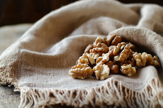 Rustic Still Life of Natural Walnuts on Linen Fabric Nutty Healthy Food Snack Organic Harvest Autumn Concept Generative AI