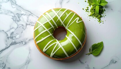 Indulge in this vibrant matcha donut with creamy white drizzle, a perfect sweet treat for a refreshing break, delicious on a modern marble background