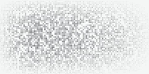 Monochrome abstract dot pattern with fading gradient for modern graphic design.