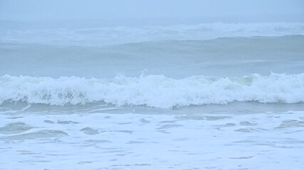 Fototapeta premium Foggy Atlantic ocean on a summer morning in Ovar, Portugal 
