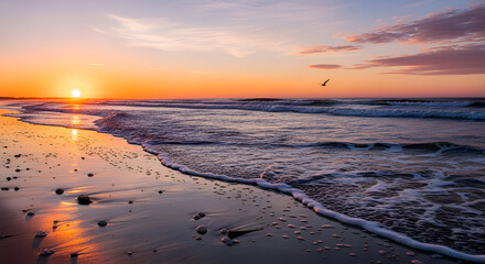 Stunning sunrise over calm ocean waves with bird soaring in the distance, perfect for travel blogs, coastal living, and serene getaway promotions