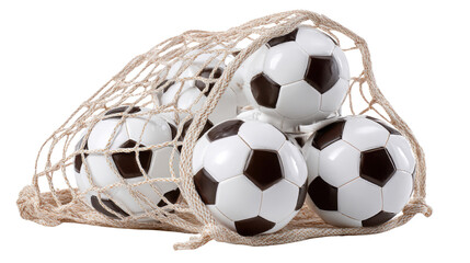 Collection of classic black and white soccer balls tightly packed inside sports net representing training equipment, teamwork and athletic activity on white background