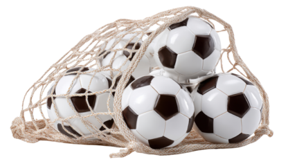 Collection of classic black and white soccer balls tightly packed inside sports net representing training equipment, teamwork and athletic activity on white background